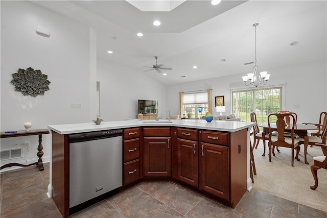 kitchen featuring dishwasher, pendant lighting, ceiling fan with notable chandelier, and a kitchen island with sink