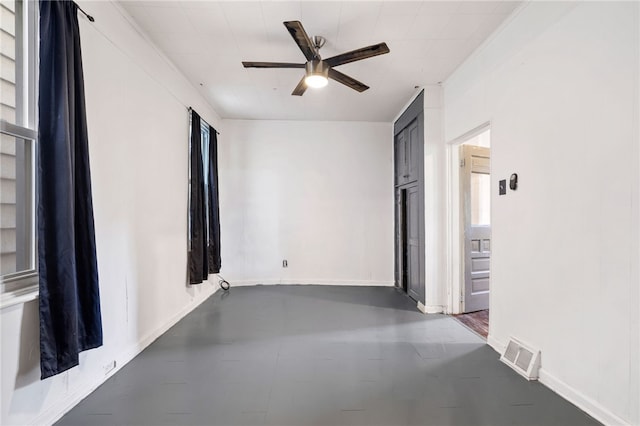 spare room featuring ceiling fan