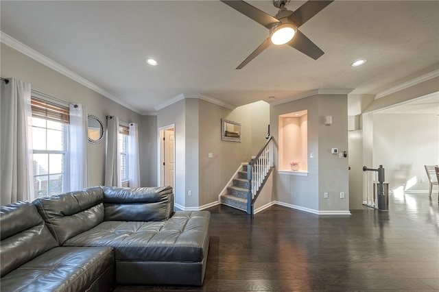 living room featuring ornamental molding, dark hardwood / wood-style floors, and ceiling fan