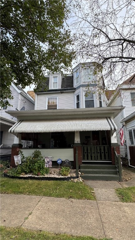 view of front facade with covered porch