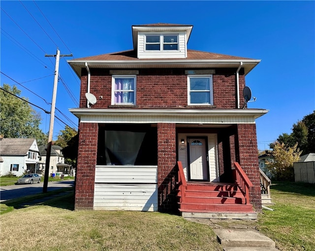 view of front of property with a front lawn