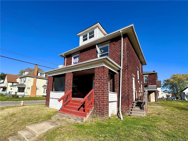 view of front of home featuring a front lawn