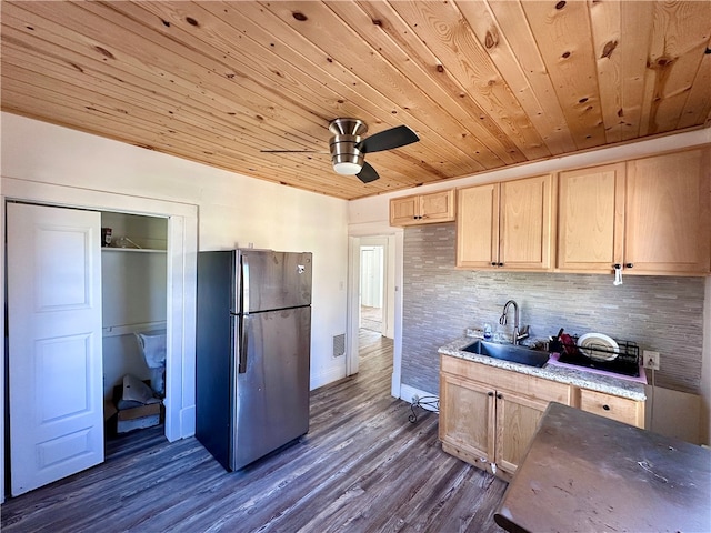 kitchen with sink, dark hardwood / wood-style flooring, light brown cabinetry, stainless steel refrigerator, and ceiling fan