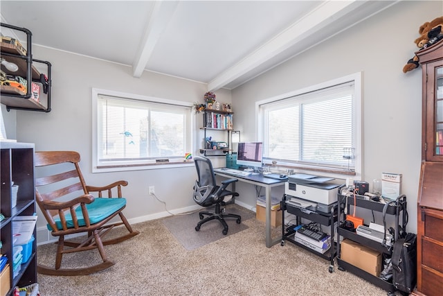 carpeted office featuring beamed ceiling