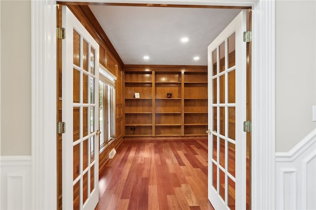 interior space featuring light hardwood / wood-style floors and french doors