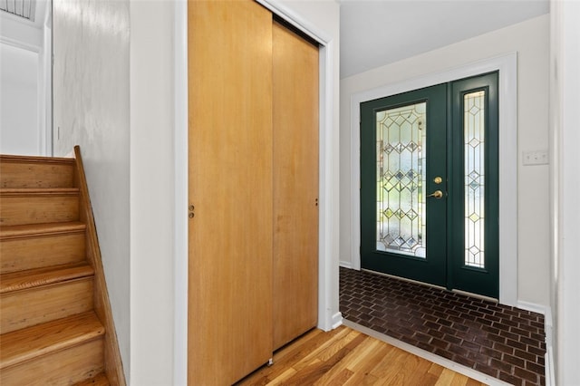 foyer entrance featuring light hardwood / wood-style flooring