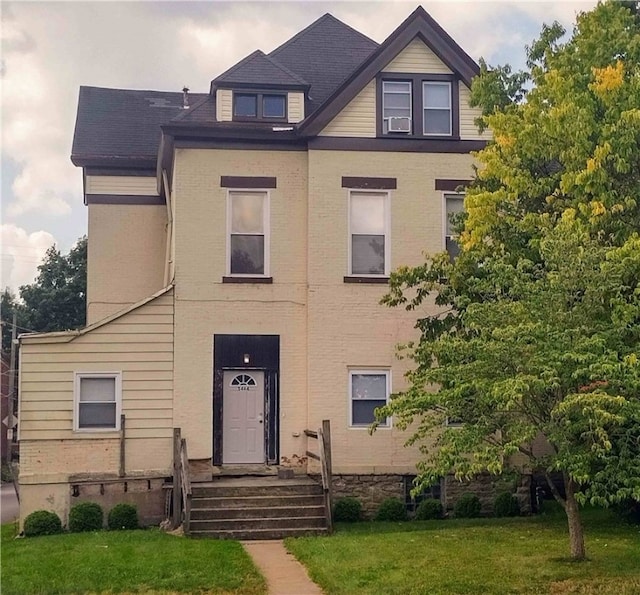 view of front of home with a front yard