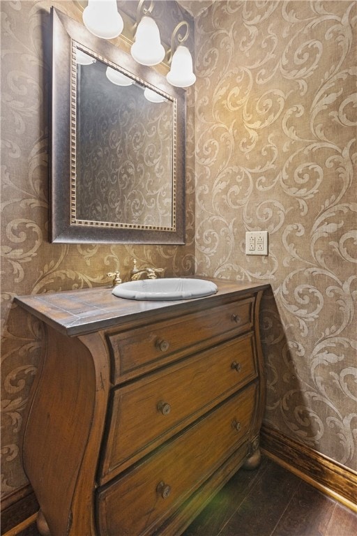 bathroom featuring vanity and hardwood / wood-style flooring