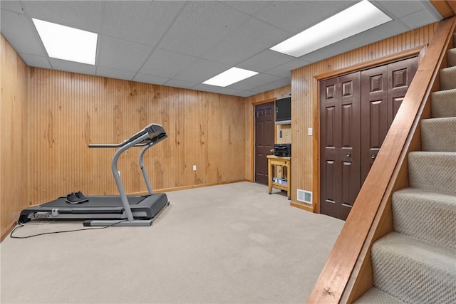 69 Orchard St, Carroll Twp, PA 15022 - exercise room featuring carpet floors, wooden walls, and baseboards