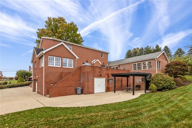 rear view of house featuring a patio area, a garage, a lawn, and a pergola