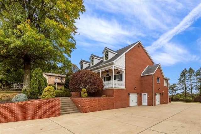 view of side of home with a garage