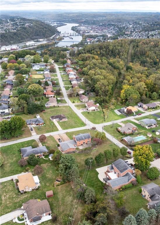 69 Orchard St, Carroll Twp, PA 15022 - aerial view of property's location featuring a large body of water and nearby suburban area