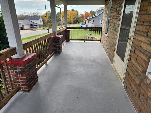 view of patio featuring a porch