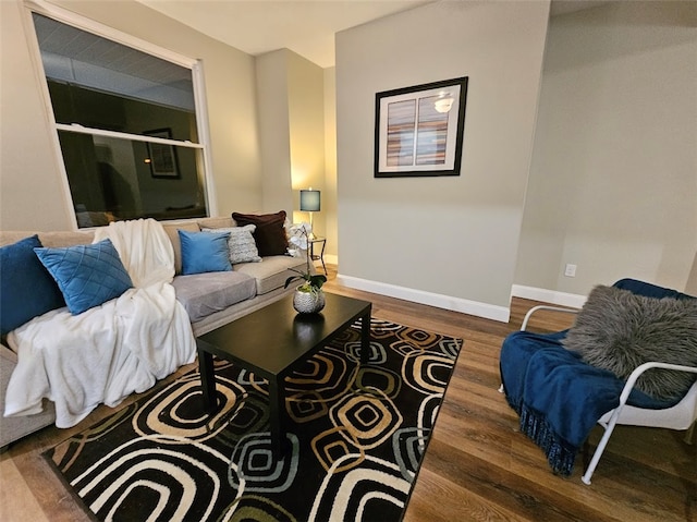 living room featuring dark hardwood / wood-style floors