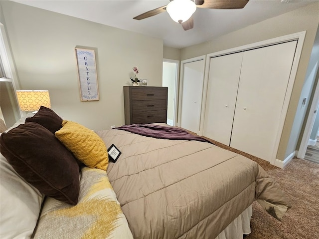 carpeted bedroom with ceiling fan