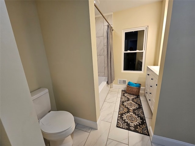 bathroom with vanity, toilet, and a shower with curtain