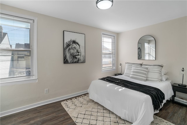 bedroom featuring wood-type flooring