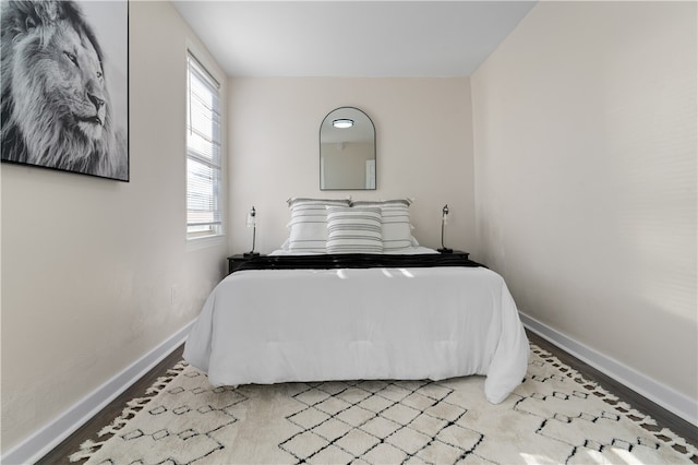 bedroom with light wood-type flooring