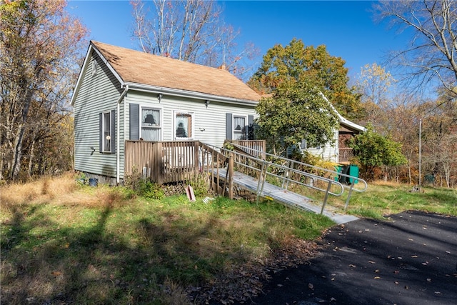 view of front of property featuring a deck