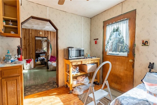 interior space featuring ceiling fan and light hardwood / wood-style flooring