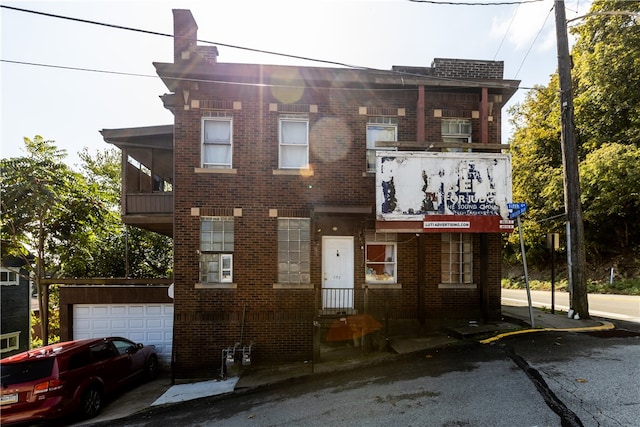 view of front of home with a balcony