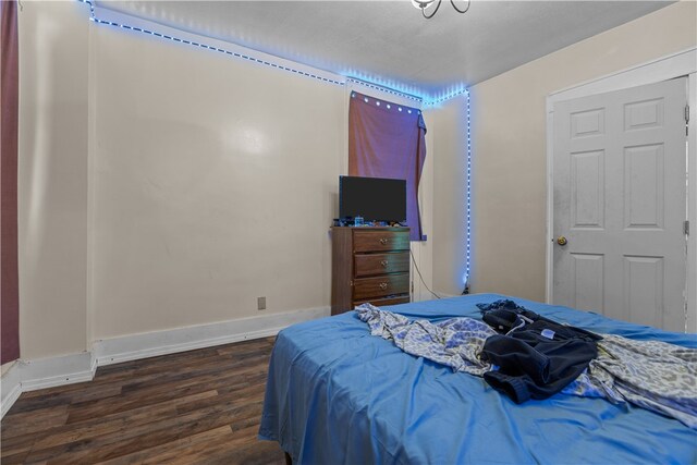 bedroom featuring dark hardwood / wood-style floors