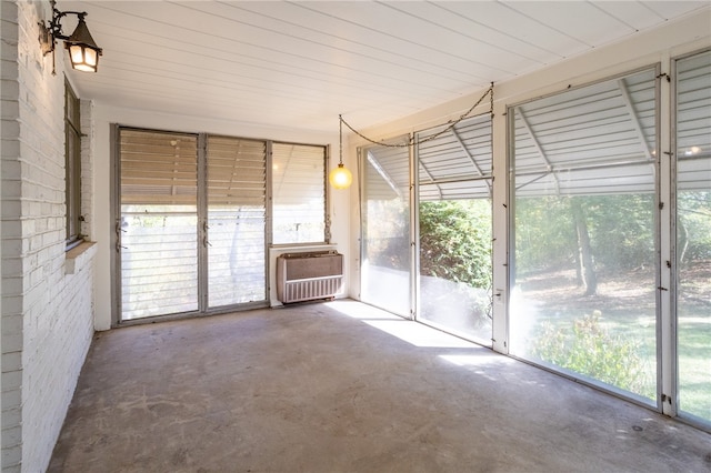 unfurnished sunroom with a wealth of natural light