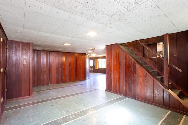 basement with wood walls