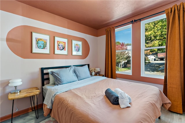 bedroom featuring a textured ceiling