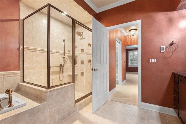 bathroom with vanity, crown molding, tile patterned floors, and independent shower and bath