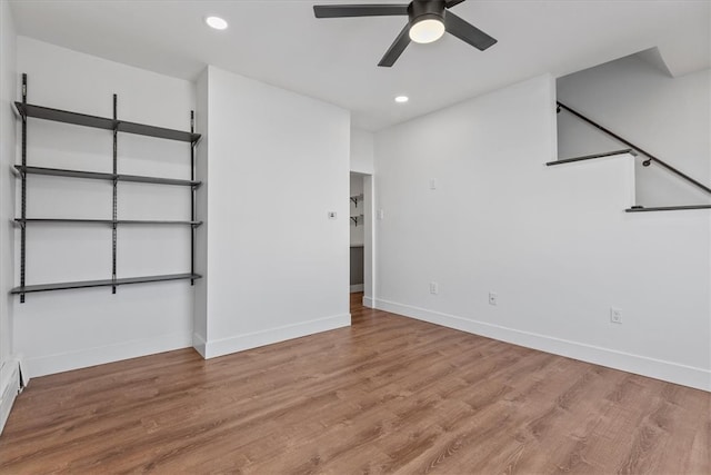 interior space with ceiling fan and light wood-type flooring