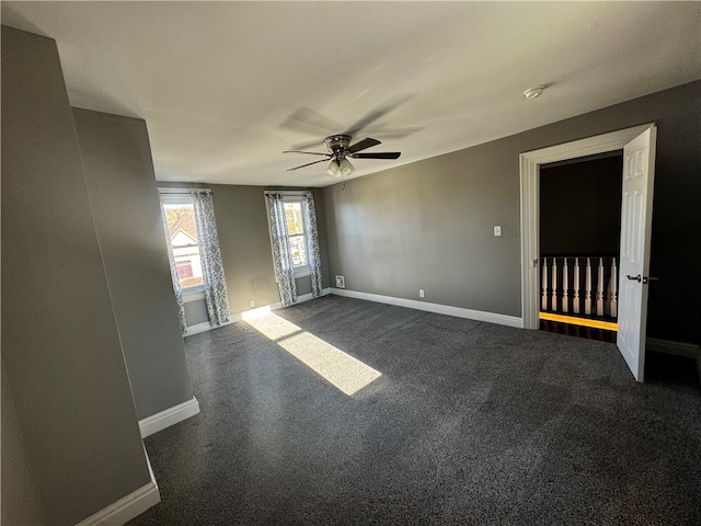 unfurnished room with ceiling fan