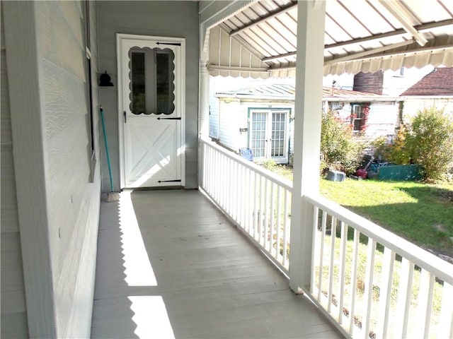 balcony featuring a porch