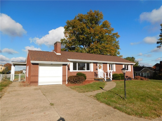 ranch-style house featuring a front lawn and a garage