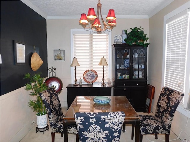 58 Mullen St, South Union Twp, PA 15401 - dining area featuring an inviting chandelier, ornamental molding, and a textured ceiling