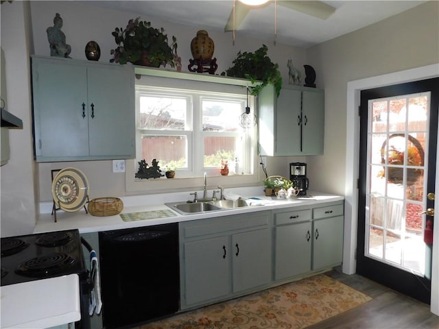 58 Mullen St, South Union Twp, PA 15401 - kitchen featuring a sink, range hood, light countertops, and black appliances