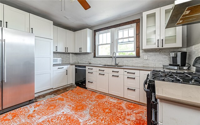 kitchen with white cabinetry, black appliances, and exhaust hood