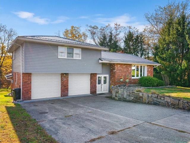 split level home featuring a garage