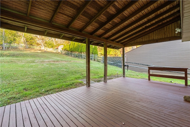 wooden terrace with a yard