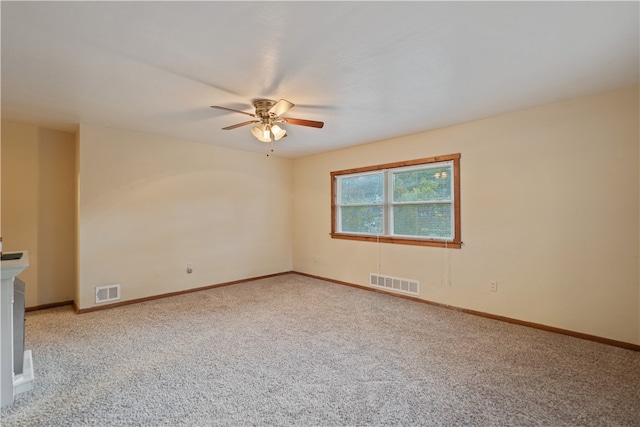 unfurnished room with carpet floors and ceiling fan