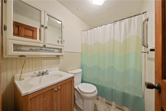 bathroom featuring vanity, a textured ceiling, a shower with curtain, and toilet