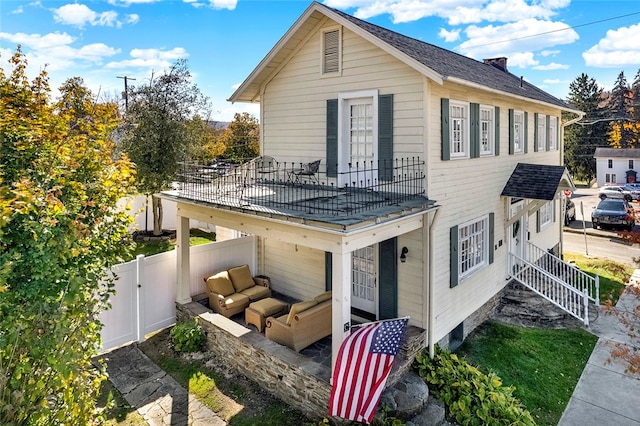 view of home's exterior featuring outdoor lounge area