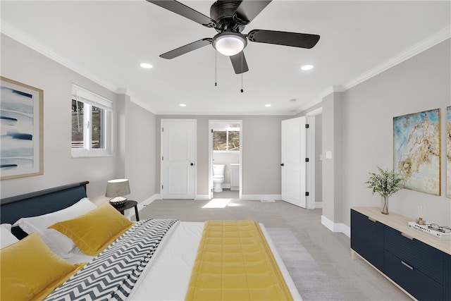 bedroom featuring light carpet, ornamental molding, connected bathroom, and ceiling fan