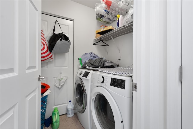 laundry room with independent washer and dryer