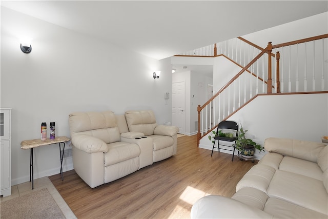 living room with light hardwood / wood-style floors