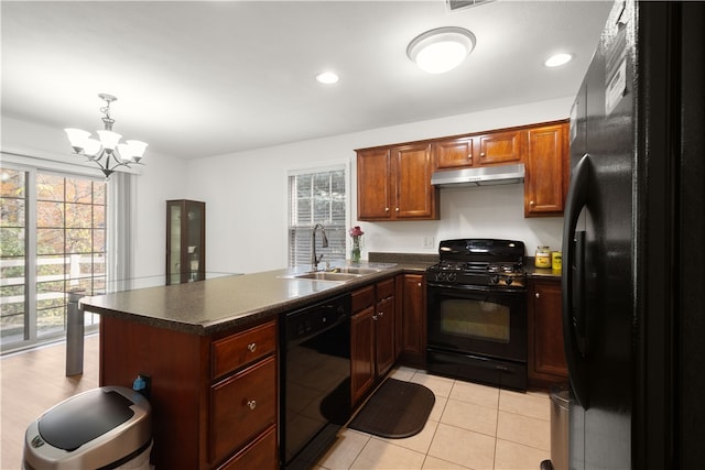 kitchen with sink, hanging light fixtures, kitchen peninsula, a chandelier, and black appliances