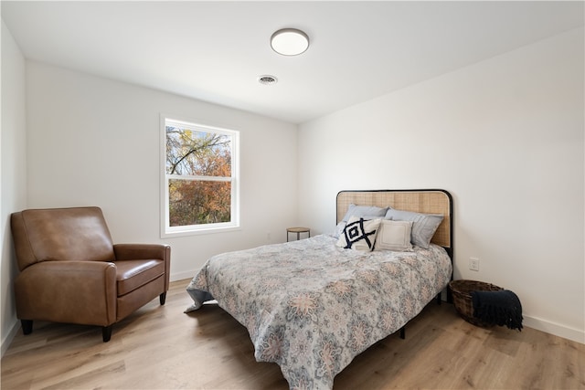 bedroom with light wood-type flooring