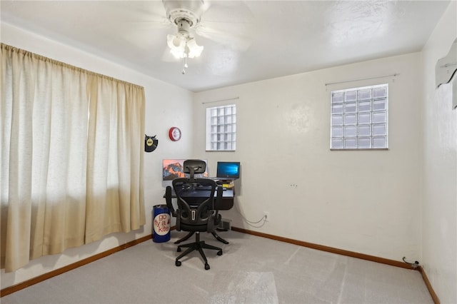 office featuring carpet flooring and ceiling fan