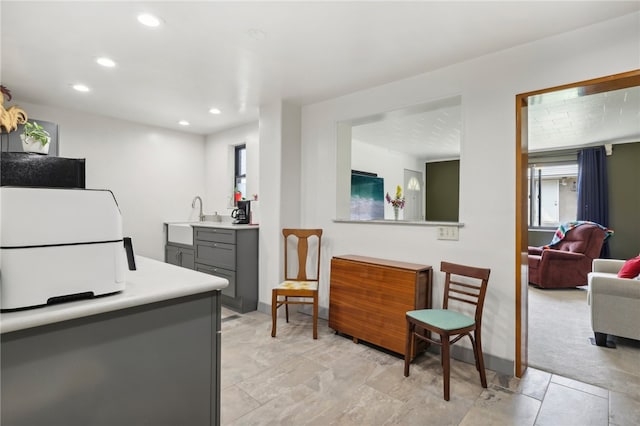 kitchen with gray cabinets and sink