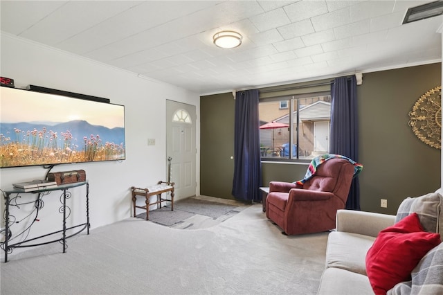 living room featuring light carpet and ornamental molding